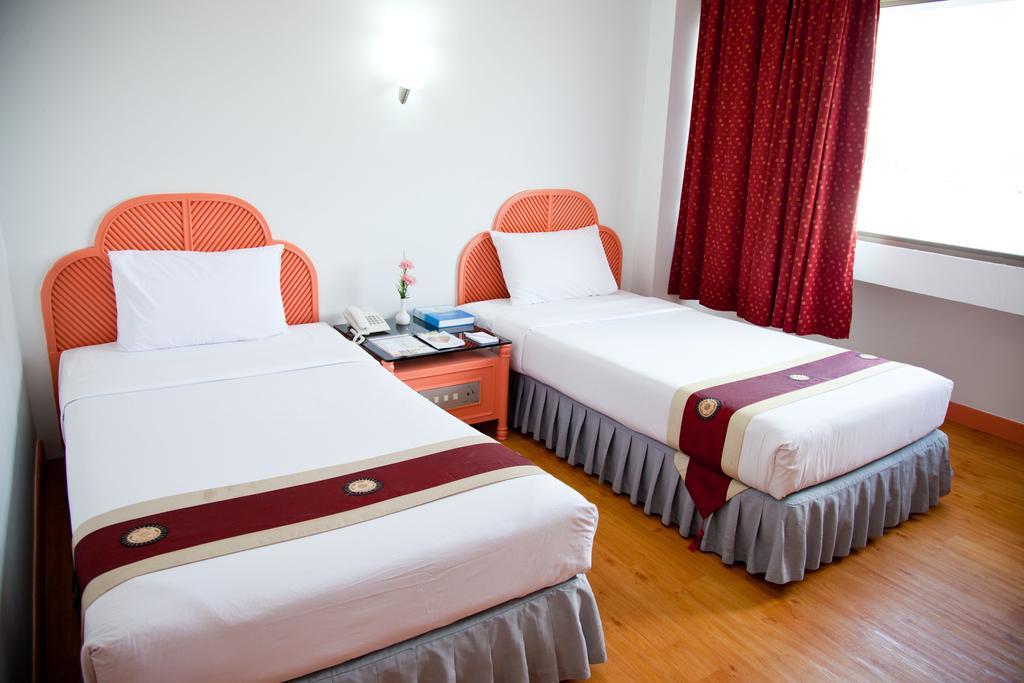 Thumrin Hotel Trang Pokoj fotografie